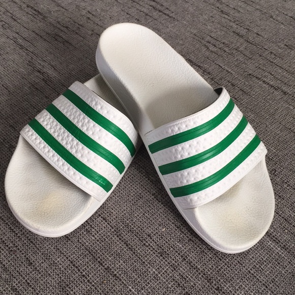 green and white adidas slides